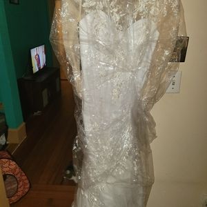 I am selling a brand new wedding dress and 2 brand new bridesmaids dresses